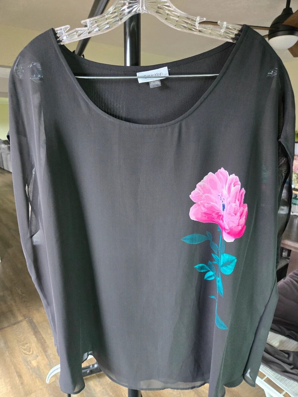 Women's Calvin Klein short-sleeve black blouse.